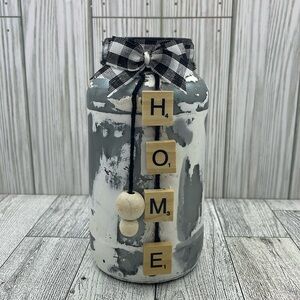 Beautiful rustic decoration of a jar with the phrase home made of wood, handmade